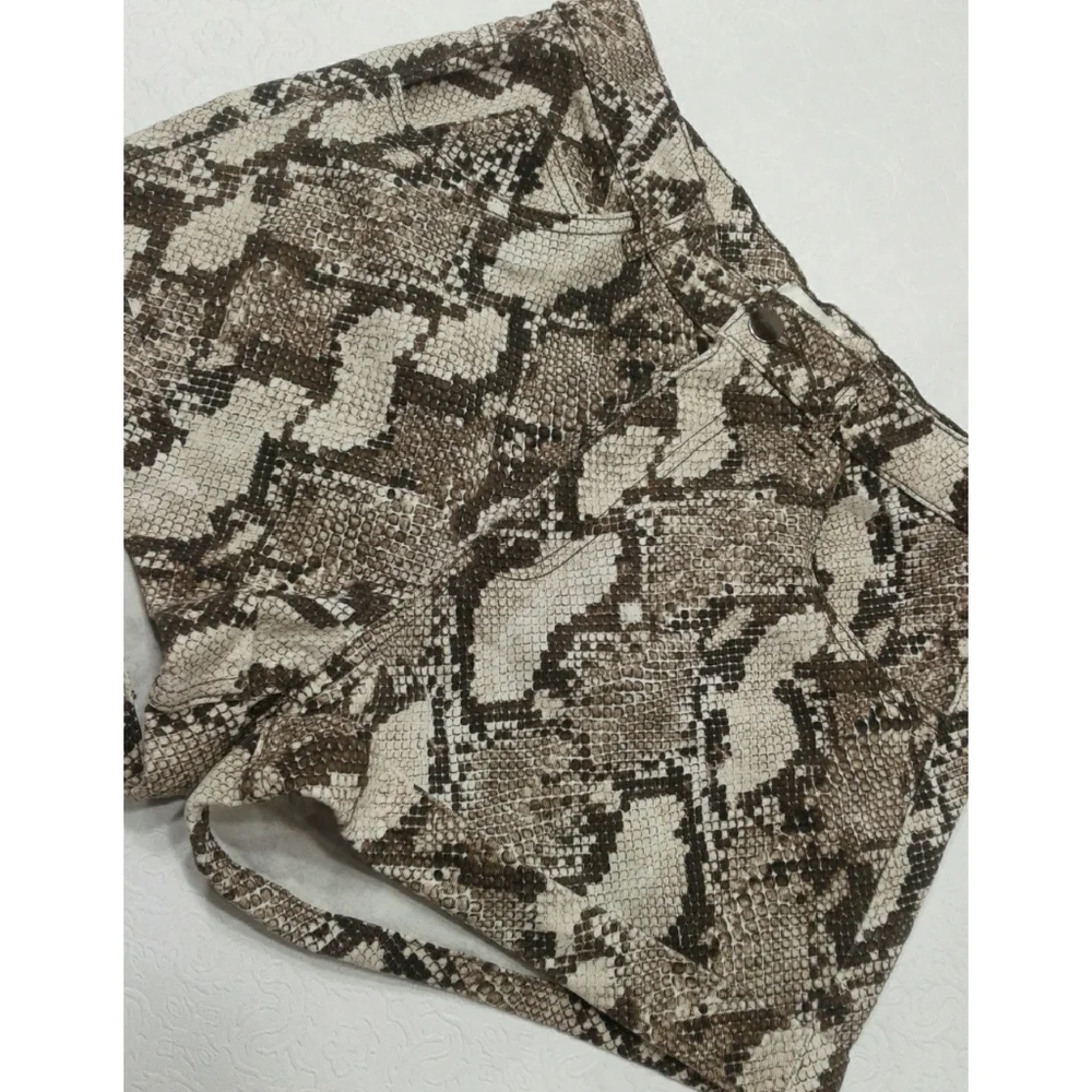 H&M snake print DENIM shorts size 10